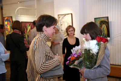 Tatiana Turkulets meeting people at the exhibition
